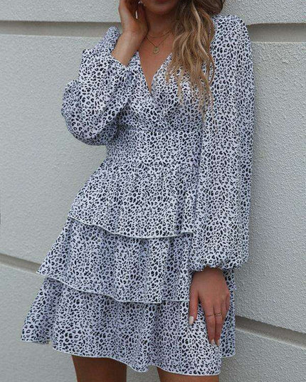 Charming Polka Dot V-Neck Dress with Puff Sleeves and Waist-Defining Style
