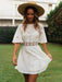Bohemian Chic Backless Fringed Dress with Elegant Lotus Sleeves for Fashion-Forward Women