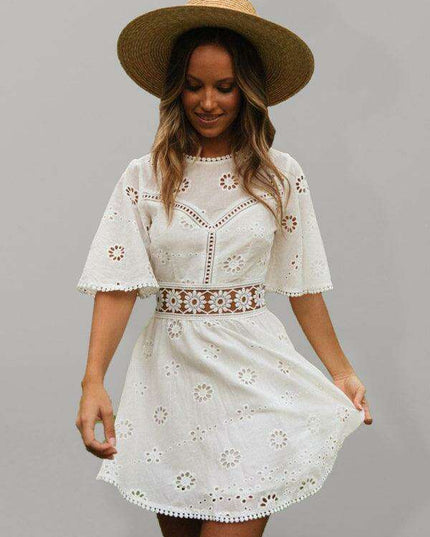 Bohemian Chic Backless Fringed Dress with Elegant Lotus Sleeves for Fashion-Forward Women