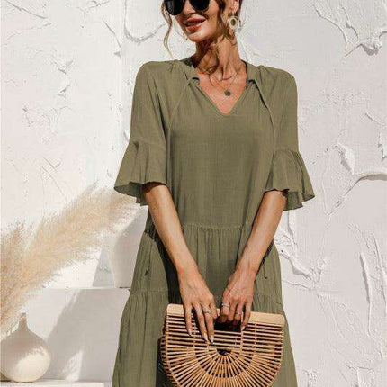 Enchanting Floral V-Neck Maxi Dress with Elegant Trumpet Sleeves and Delightful Cake Accents