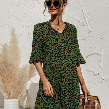 Enchanting Floral V-Neck Maxi Dress with Elegant Trumpet Sleeves and Delightful Cake Accents