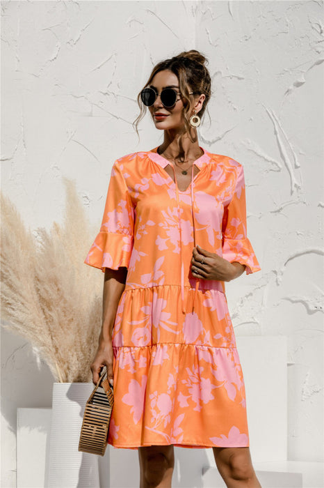 Flowy Floral V-Neck Dress with Trumpet Sleeves and Cake Style Detail