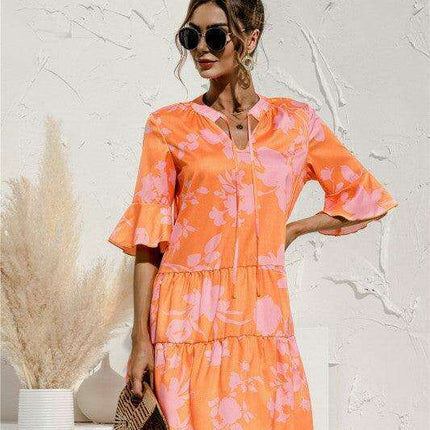 Enchanting Floral V-Neck Maxi Dress with Elegant Trumpet Sleeves and Delightful Cake Accents