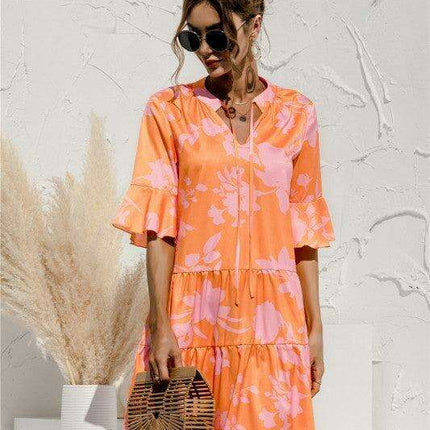 Enchanting Floral V-Neck Maxi Dress with Elegant Trumpet Sleeves and Delightful Cake Accents