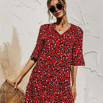 Enchanting Floral V-Neck Maxi Dress with Elegant Trumpet Sleeves and Delightful Cake Accents