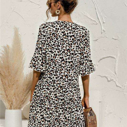 Enchanting Floral V-Neck Maxi Dress with Elegant Trumpet Sleeves and Delightful Cake Accents