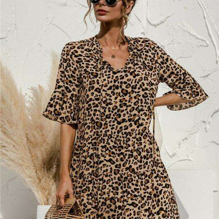 Enchanting Floral V-Neck Maxi Dress with Elegant Trumpet Sleeves and Delightful Cake Accents