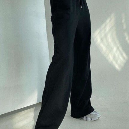 Women's solid color sports style casual loose tie wide leg pants