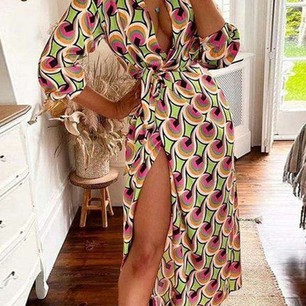 Chic Printed Lantern Sleeve Midi Dress with Tie Slit Detail