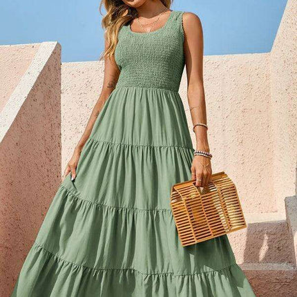 Chic Elegance: Sleek Solid Color Pleated Swing Dress for Contemporary Women