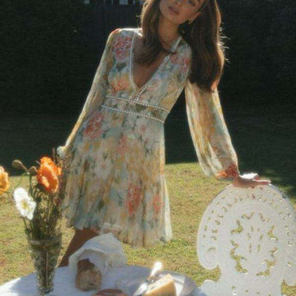 Chic Bohemian V-neck Swing Dress with Lace Trim and Puff Sleeves