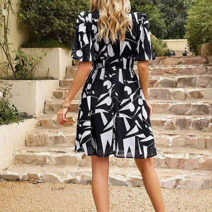 Elegant V-Neck Polyester Dress with Stylish Waist Detailing - Essential Women's Fashion Piece