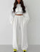 Fashionable Knit Crop Top and Wide-leg Suspender Pants Ensemble with Leisure Vibe