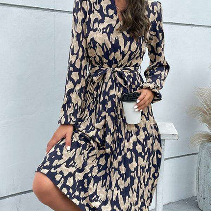 Leopard Elegance: Chic Long Sleeve Dress with Pleated Hem - Timeless and Graceful