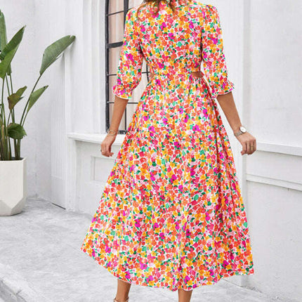 Spring and summer new holiday casual printed V-neck slit dress