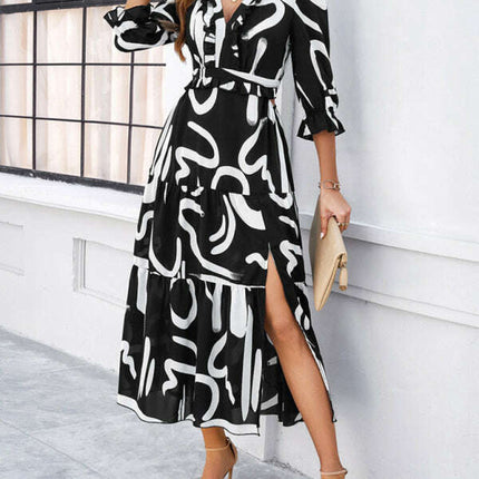 Spring and summer new holiday casual printed V-neck slit dress