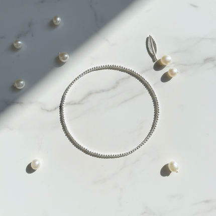 Peekaboo Studio Elegant Silver Bracelet with Adjustable Length & Charm