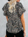 Relaxed Blooms | Women's loose-fit floral print v-neck top with short sleeves