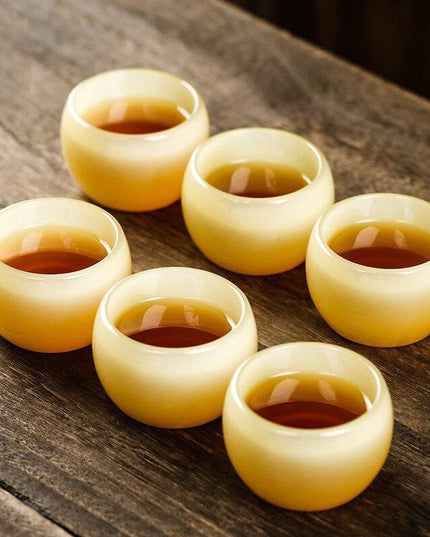 Elegant Yellow Dragon Jade Porcelain Zen Tea Cup for Tea Enthusiasts