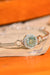Shimmering Sterling Silver Bangle with Moissanite and Zircon Details
