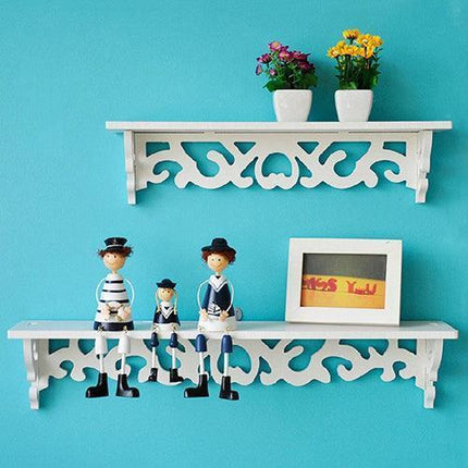 Chic White Carved Wood Wall Shelf with Unique Hollow Design for Organized Living Spaces