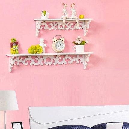 Chic White Carved Wood Wall Shelf with Unique Hollow Design for Organized Living Spaces