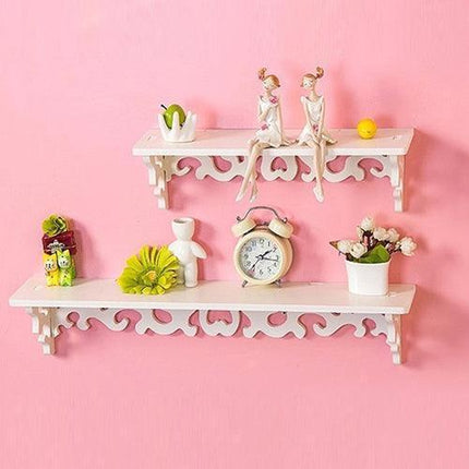 Chic White Carved Wood Wall Shelf with Unique Hollow Design for Organized Living Spaces