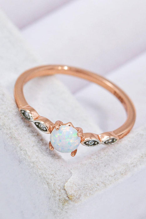 Opal and Platinum Ring: Timeless Elegance in Simplicity