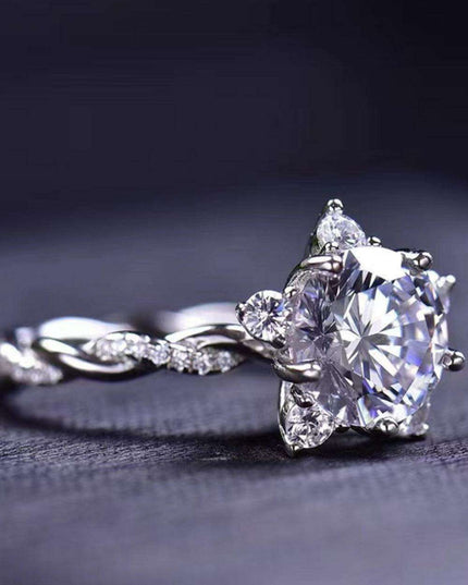 Radiant Elegance: Twisted 3 Carat Lab-Diamond Sterling Silver Ring with Platinum Touch