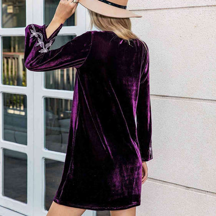 Chic V-Neck Mini Dress with Stylish Slit Sleeves