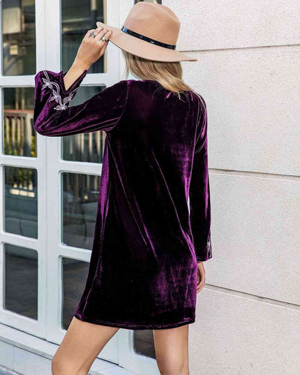 Chic V-Neck Mini Dress with Stylish Slit Sleeves
