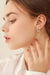 Graceful Moissanite Sterling Silver Huggie Earrings - Timeless Sophistication