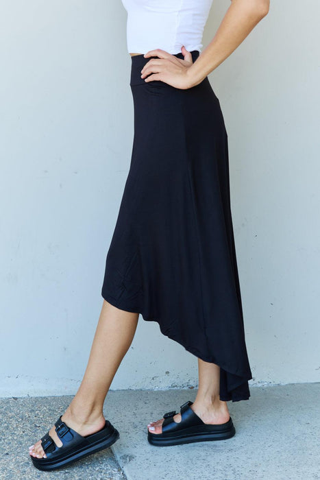 Elegant Black High-Rise Flared Maxi Skirt with Asymmetrical Hemline by Ninexis