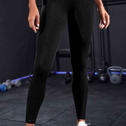 High-Waisted Active Leggings with Convenient Pockets - Durable Solid Design and Comfortable Wide Band for Fitness Enthusiasts