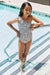 Flounce Black One-Piece Ruffle Swimsuit - Marina West Swim Float On