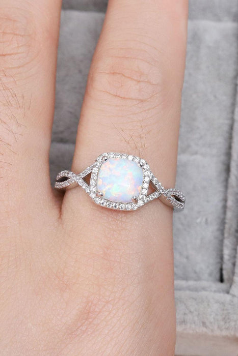 Opal Crisscross Ring adorned with Opulence
