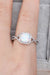 Opulent Opal Crisscross Ring with Elegant Accents