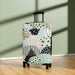 Travel in Style with the Peekaboo Luggage Guardian - Keep Your Suitcase Secure with a Twist