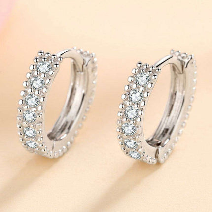 Brilliant Sterling Silver Huggie Earrings with Lab-Diamonds and Care Tips