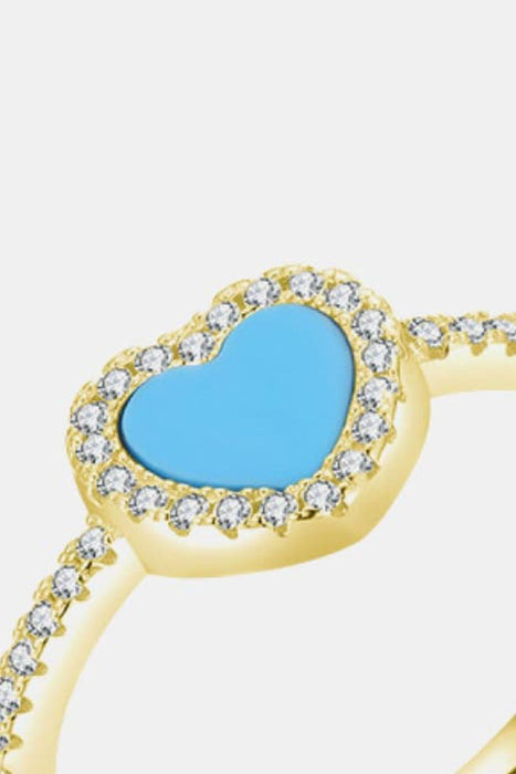 Turquoise Splendor: Sterling Silver Ring Enhanced with Platinum and Gold Accents