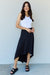 Chic Black High-Waisted Maxi Skirt with Asymmetrical Hemline by Ninexis