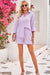 Chic Collared Blouse and Shorts Ensemble with Handy Pockets