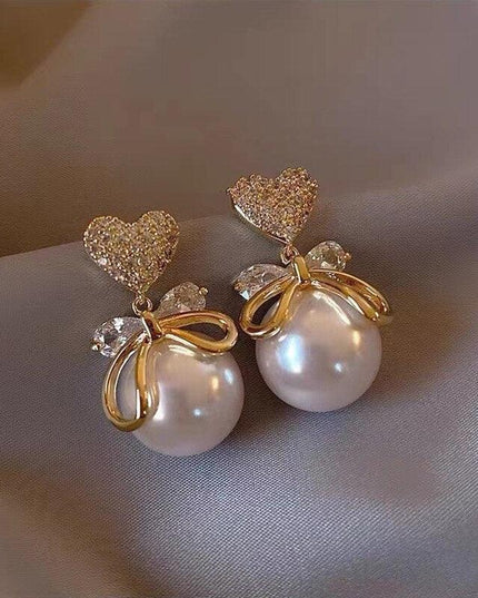 Delightful Gold Cupid Angel Stud Earrings - Elegant Women's Accessory