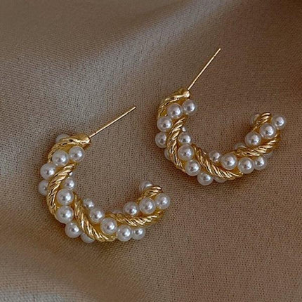 Delightful Gold Cupid Angel Stud Earrings - Elegant Women's Accessory