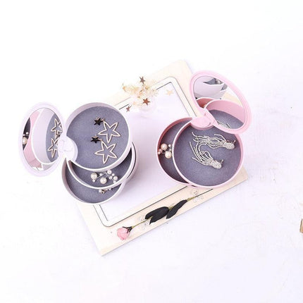 Chic European Jewelry Organizer with Rotating Mirror and Multi-Tiered Storage - Très Elite