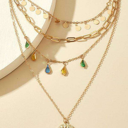 Chic Layered Necklace with Rhinestone Tassel and Geometric Discs - Très Elite