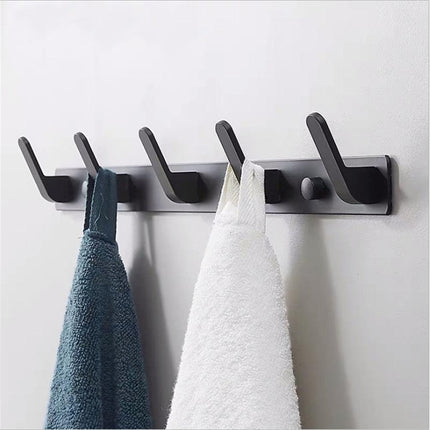 Chic Wall-Mounted Storage Organizer with Hooks and Shelf - Sleek Home Organization Solution..
