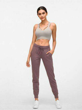Chic and Functional: Trendy Tied Joggers with Versatile Pockets - Très Elite