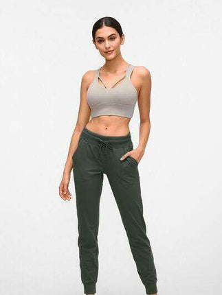 Chic and Functional: Trendy Tied Joggers with Versatile Pockets - Très Elite