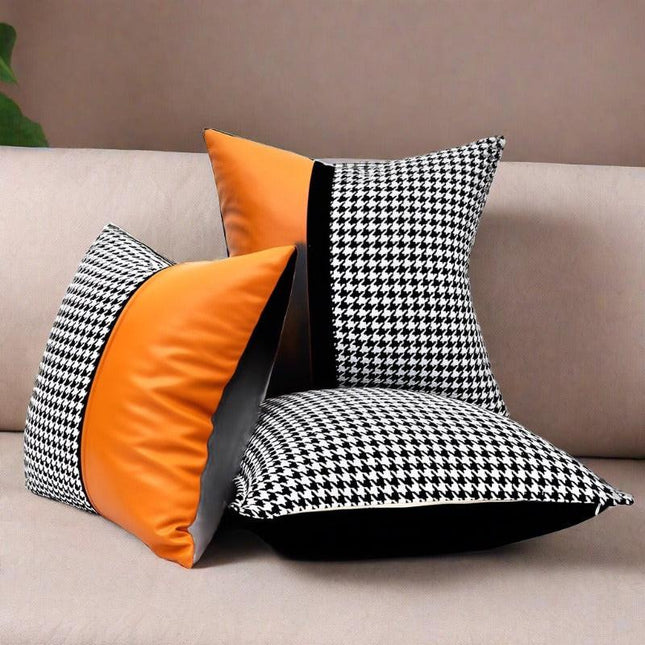 Elegant Black & White Grid Cushion Cover with Vibrant Orange Accent